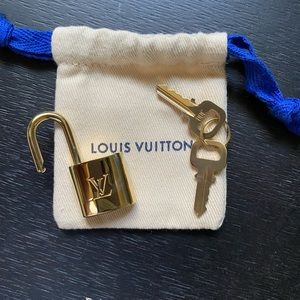Louis Vuitton lock with two keys.
